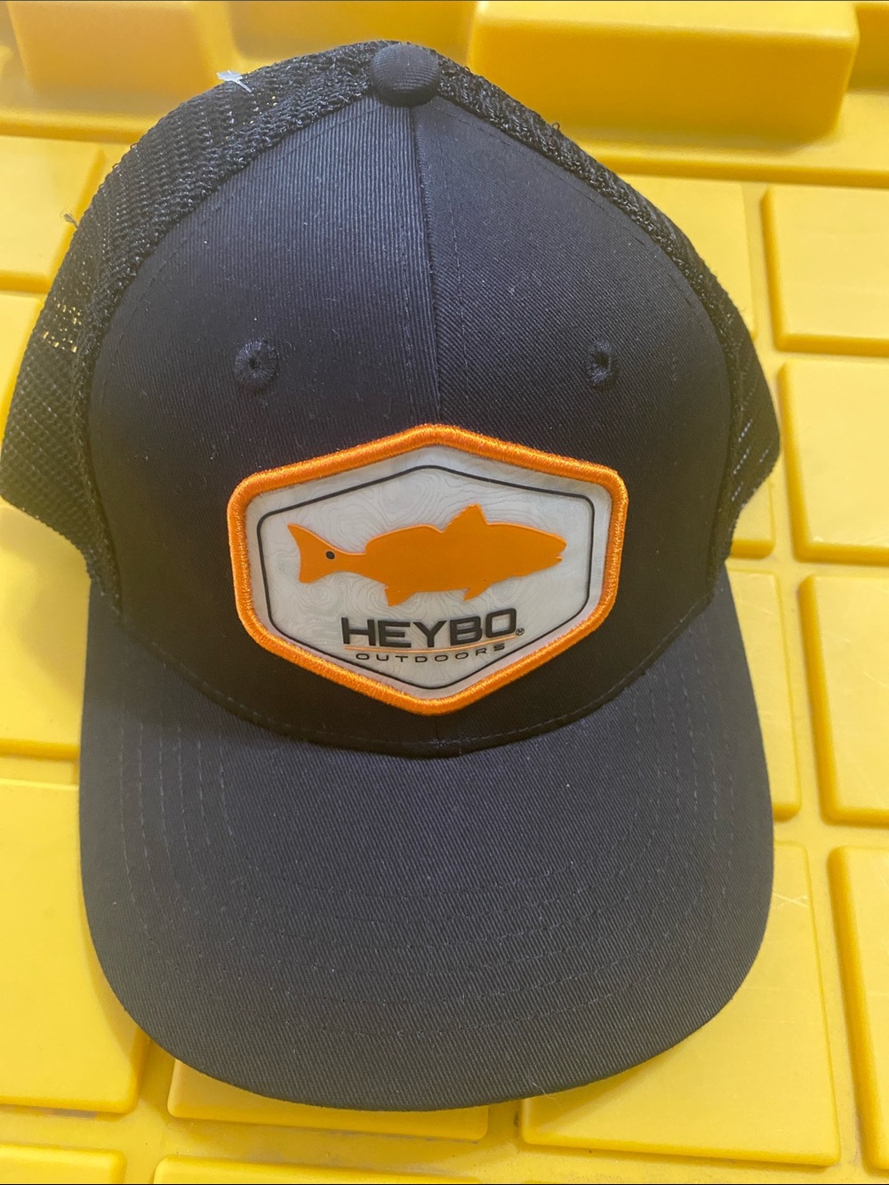 Heybo Outdoors Black Trucker Hat with Orange Fish Patch. NWOT